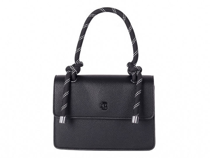 Bolso de mano negro con textura rugosa y asas decorativas de cuerda trenzada en blanco y negro.