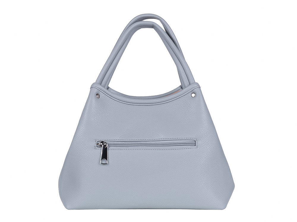 Bolso de hombro color azul jeans con textura rugosa y detalles metálicos plateados.