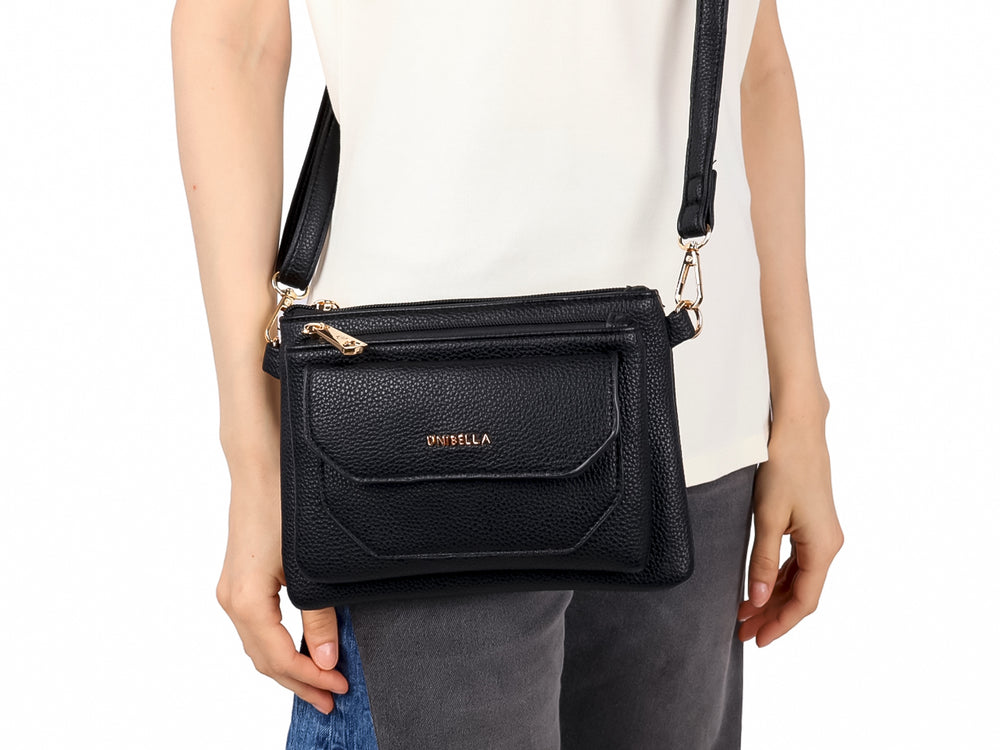 Bolso pequeño de hombro color negro con textura rugosa, cierre dorado y logotipo Unibella en el frente.