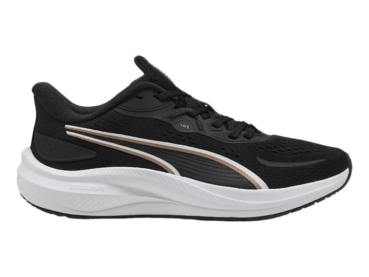 Tenis deportivos PUMA Skyrocket Lite 2 en color negro con detalles dorados y suela blanca para mujer.