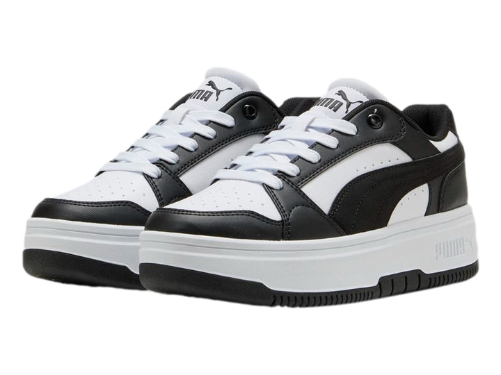Tenis PUMA Rebound Femme Low en colores blanco y negro con suela de plataforma blanca.