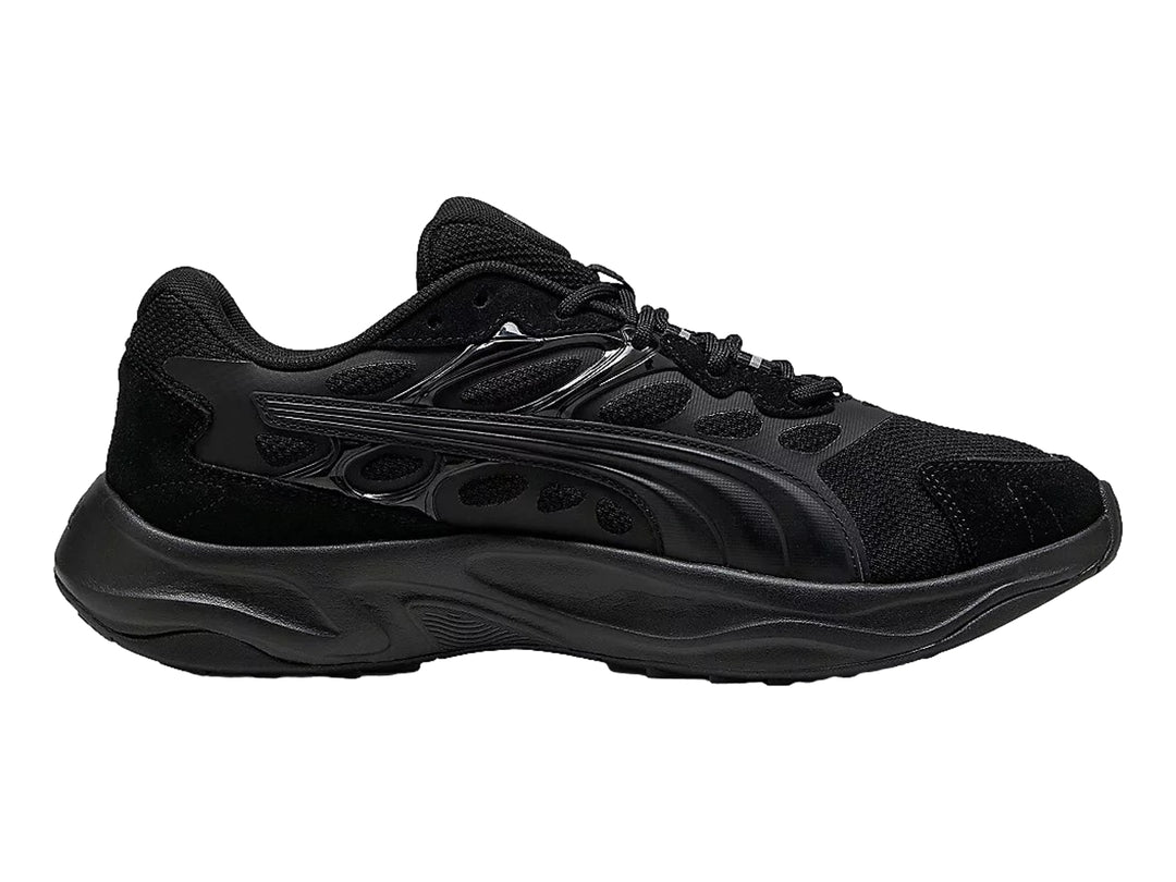Tenis deportivos PUMA Insphere en color negro total con suela robusta y detalles sintéticos.