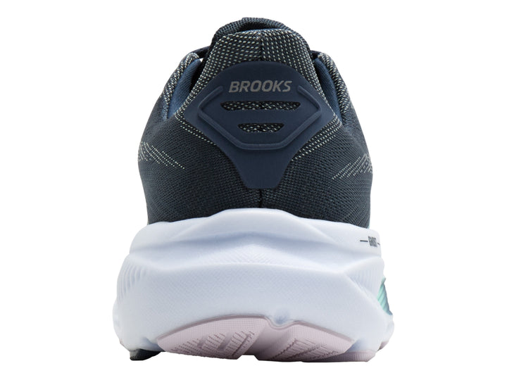 Tenis deportivos Brooks Ghost 17 color azul oscuro con suela blanca y detalles en verde menta.