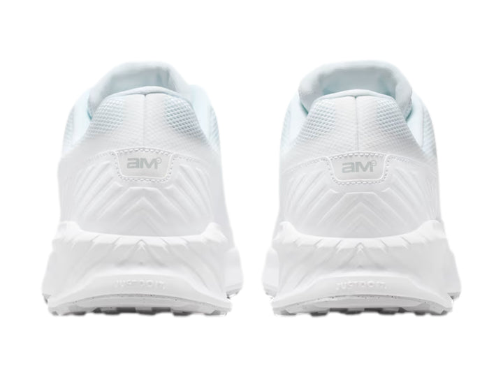 Tenis Nike Air Max color blanco con logotipo negro lateral y suela blanca con cámara de aire visible.