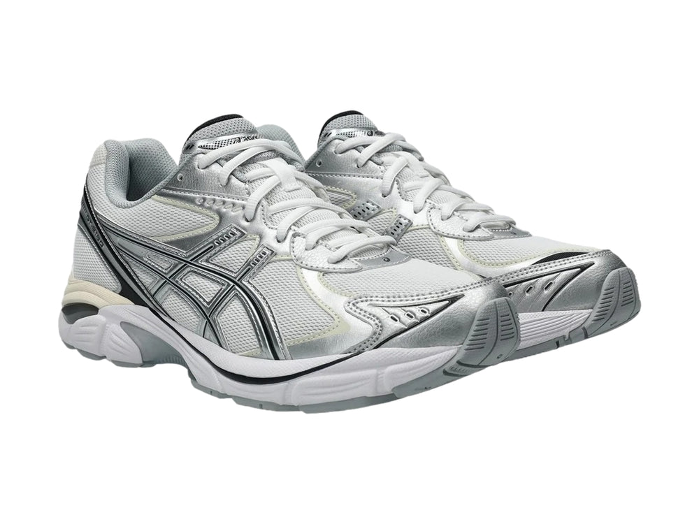 Tenis deportivos ASICS GT-2160 en color blanco y plata con diseño de malla y detalles sintéticos.