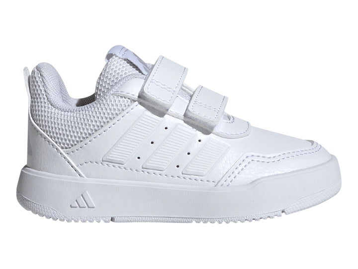 Tenis deportivos Adidas blancos con cierres de velcro y detalles de malla.