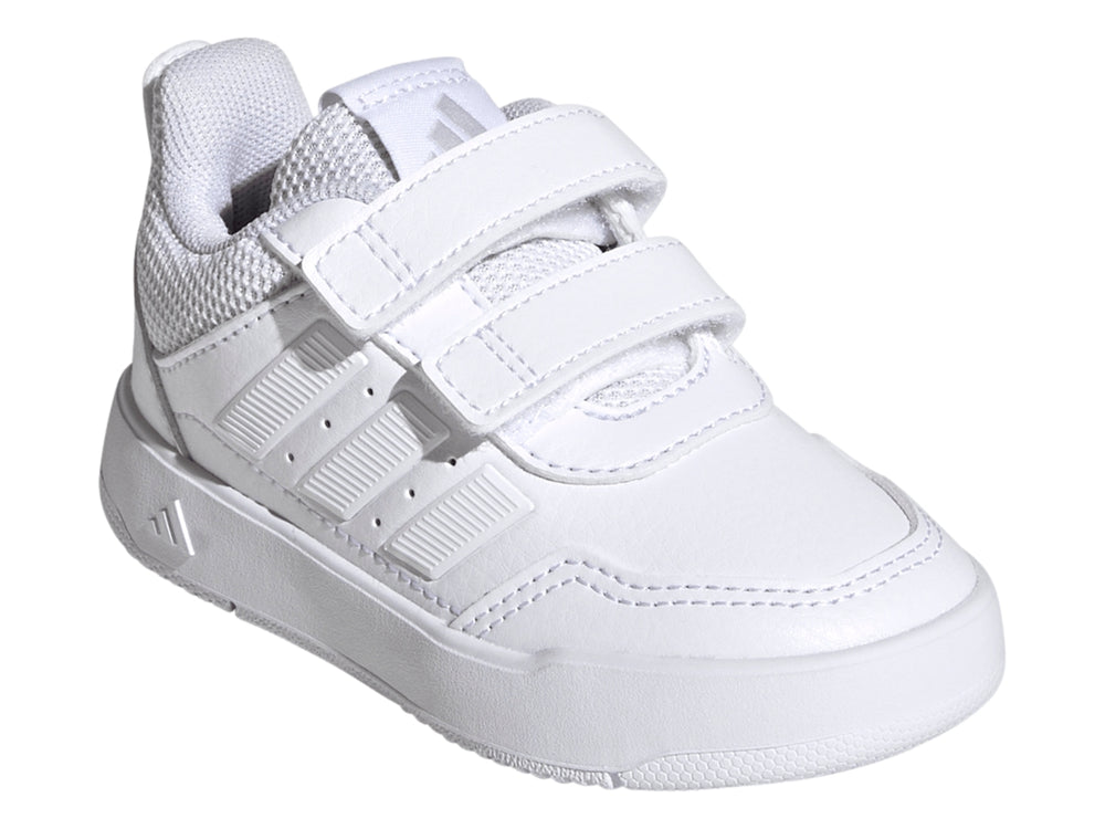 Tenis deportivos Adidas blancos con cierres de velcro y detalles de malla.
