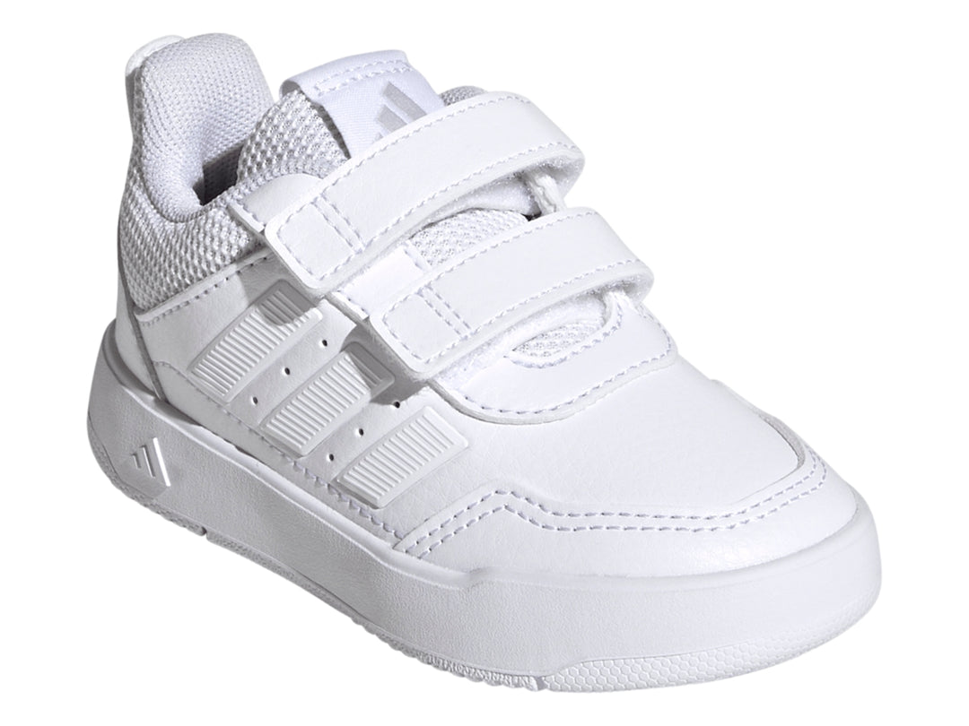 Tenis deportivos Adidas blancos con cierres de velcro y detalles de malla.