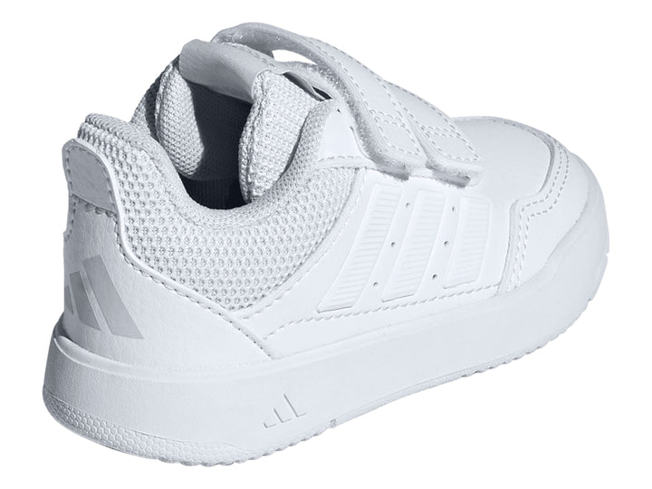 Tenis deportivos Adidas blancos con cierres de velcro y detalles de malla.