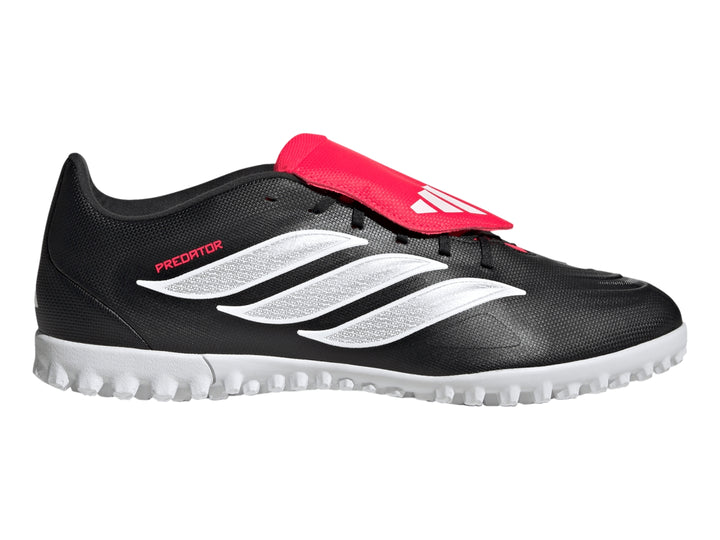 Zapato de fútbol Adidas Predator Club FT TF en color negro con franjas blancas y lengüeta roja.