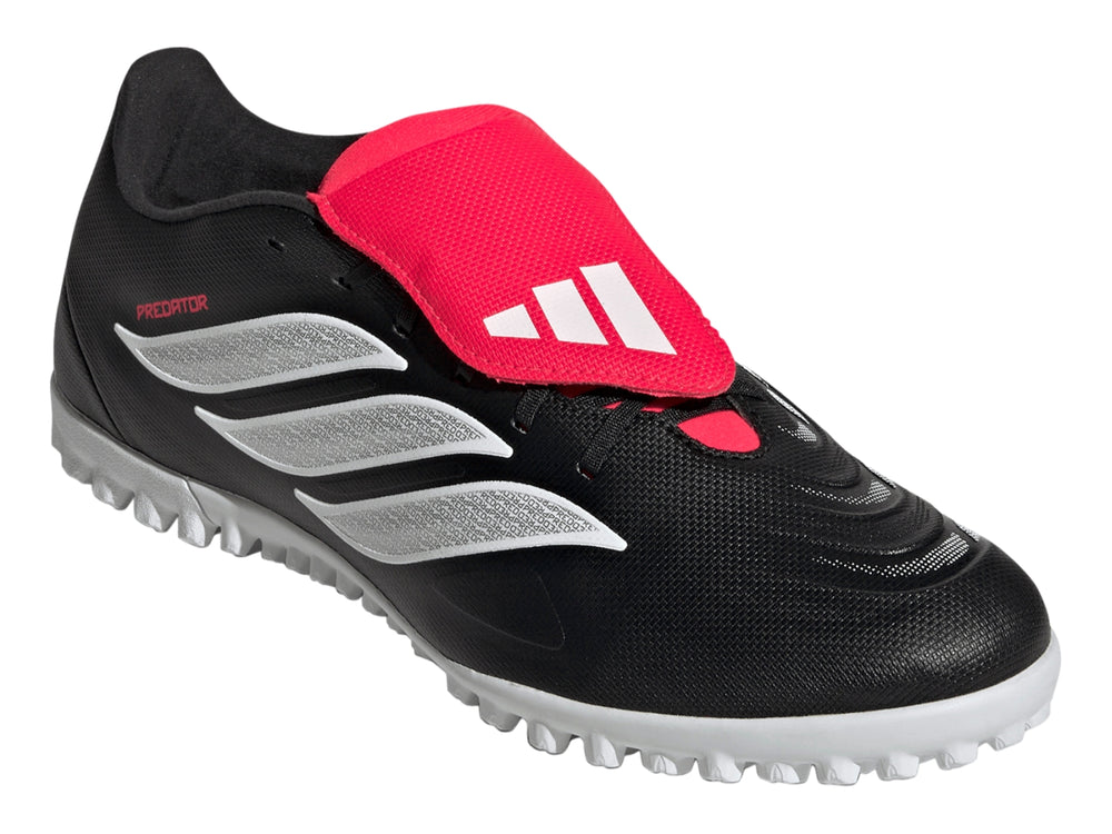 Zapato de fútbol Adidas Predator Club FT TF en color negro con franjas blancas y lengüeta roja.