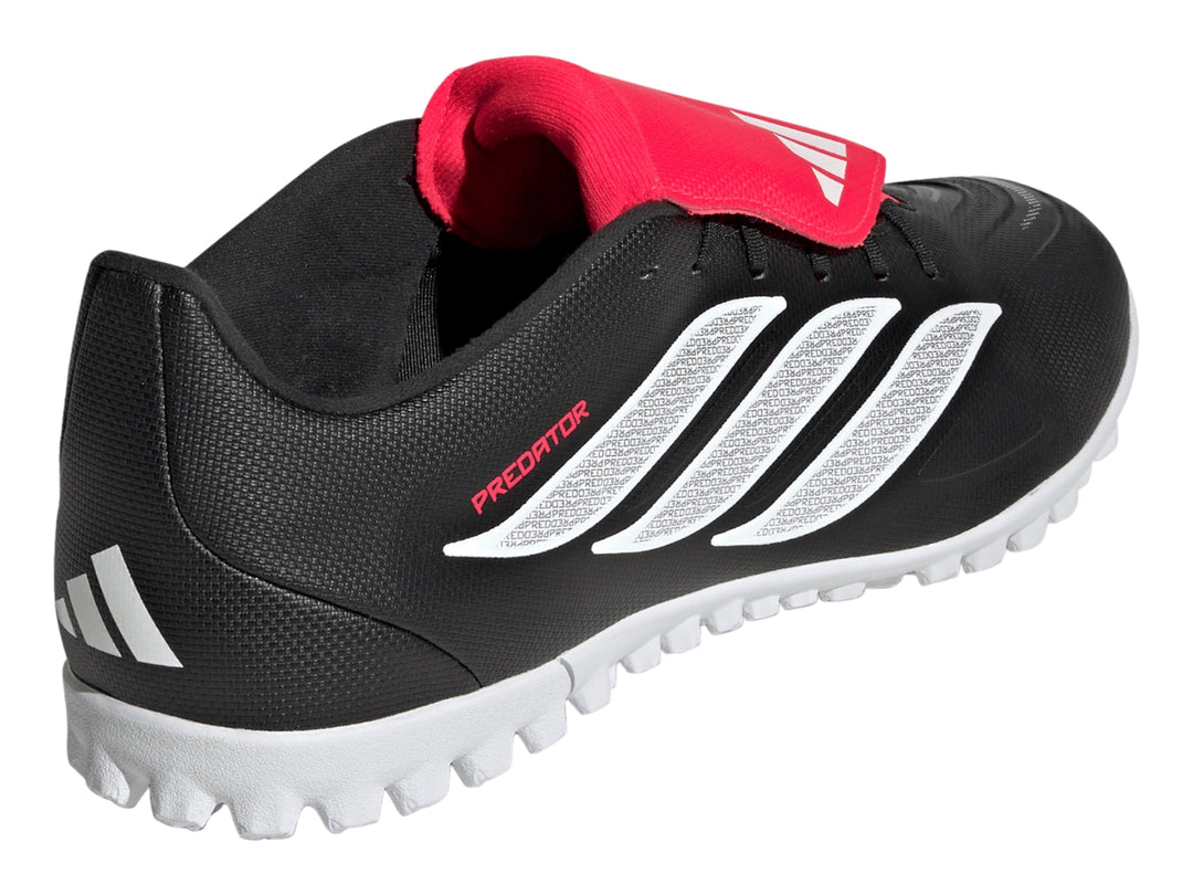 Zapato de fútbol Adidas Predator Club FT TF en color negro con franjas blancas y lengüeta roja.