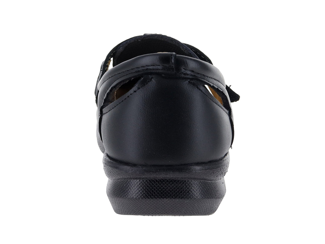 Zapato cerrado color negro para mujer, estilo confort con suela plana y correa ajustable.