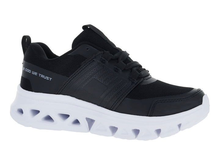 Tenis deportivos Andrax en color negro con suela blanca gruesa y detalles textiles.