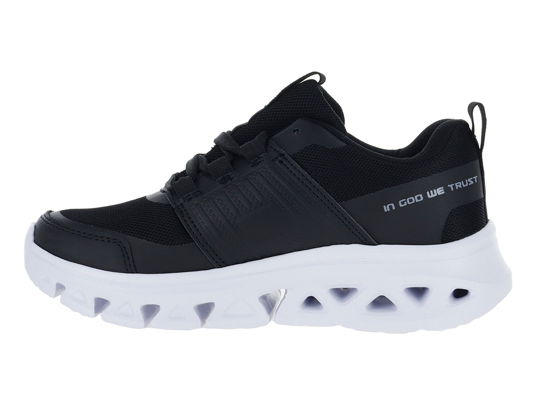 Tenis deportivos Andrax en color negro con suela blanca gruesa y detalles textiles.