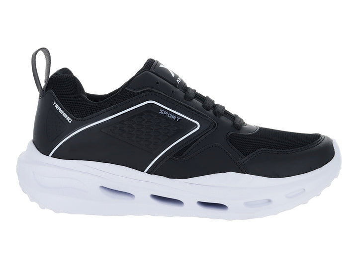 Tenis deportivos Andrax color negro con suela blanca ancha y detalles en textil.