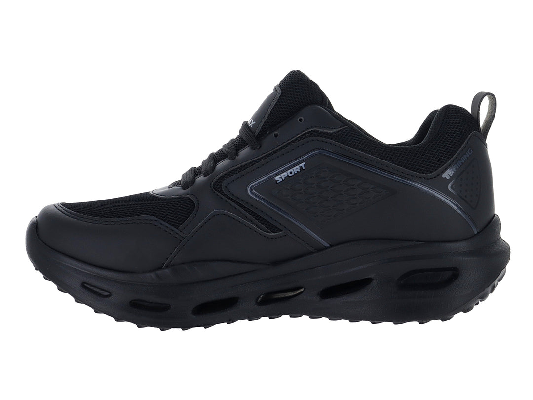 Tenis deportivos Andrax color negro con suela gruesa y detalles en textil.