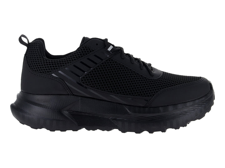Tenis deportivos Andrax color negro con suela gruesa y parte superior de malla.