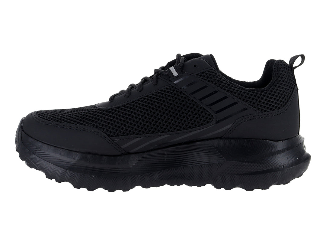 Tenis deportivos Andrax color negro con suela gruesa y parte superior de malla.