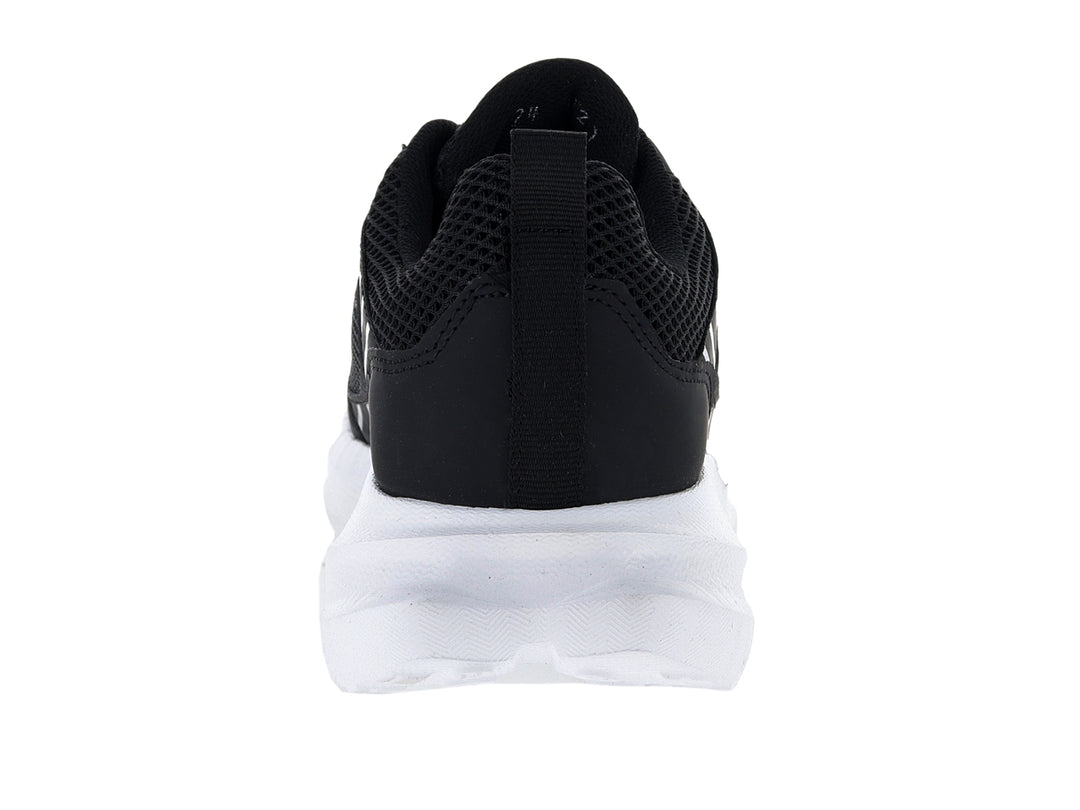 Tenis deportivos Andrax color negro con suela blanca ancha y detalle rojo en la lengüeta.