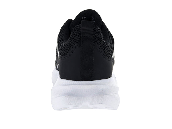 Tenis deportivos Andrax color negro con suela blanca ancha y detalle rojo en la lengüeta.