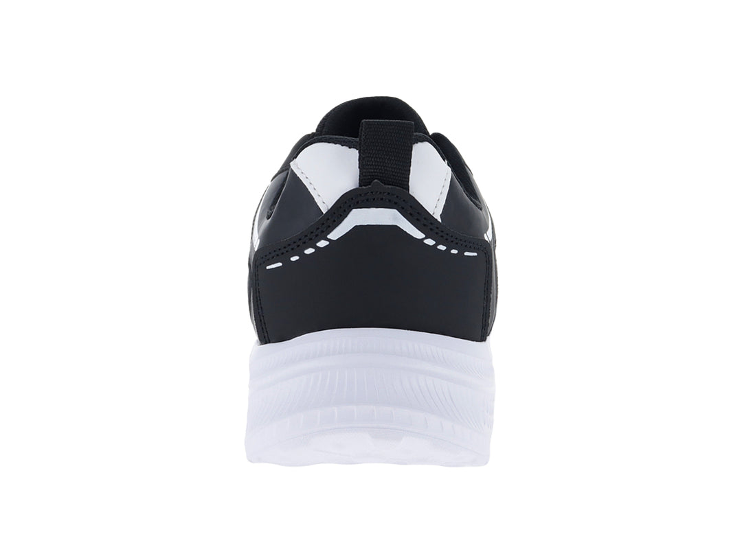 Tenis deportivos Andrax color negro con suela blanca gruesa y detalles en textil.