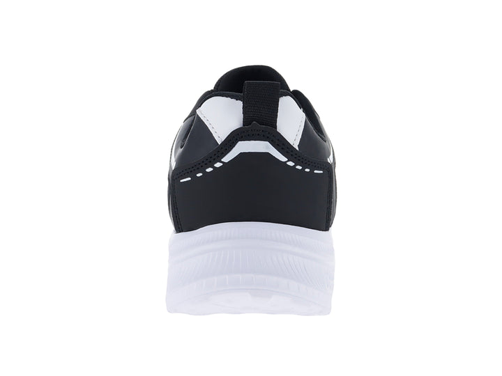 Tenis deportivos Andrax color negro con suela blanca gruesa y detalles en textil.
