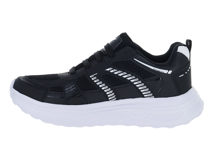 Tenis deportivos Andrax color negro con suela blanca gruesa y detalles en textil.