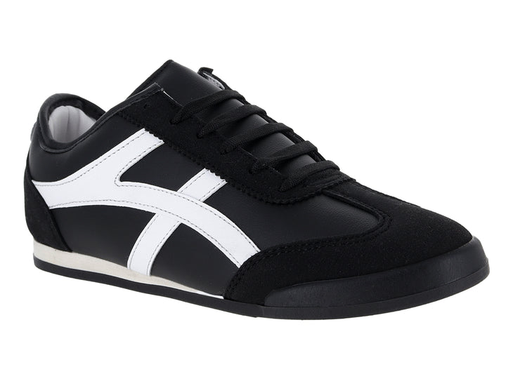 Tenis deportivos Andrax color negro con franjas blancas laterales y suela blanca.