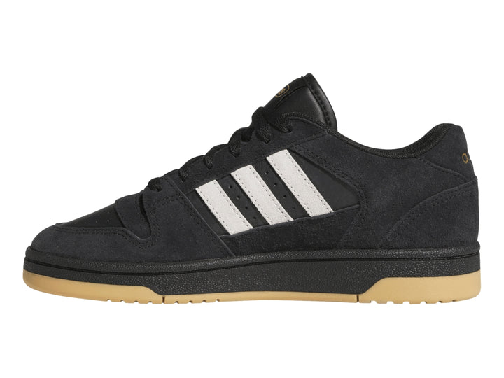 Tenis Adidas Break Start Premium Low color negro con franjas blancas y suela de goma color miel.