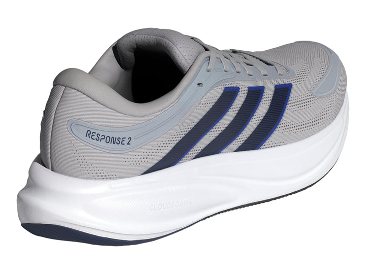 Tenis deportivos Adidas Response 2 en color gris con franjas azules y suela blanca.
