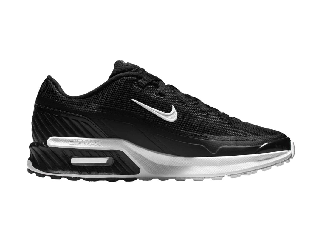 Tenis Nike Air Max color negro con suela blanca y logotipo lateral blanco.