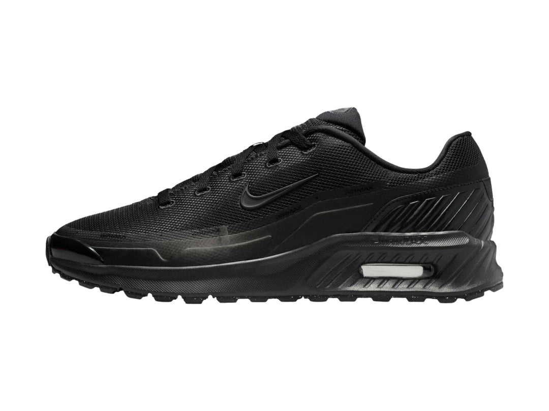 Tenis Nike Air Max color negro con suela amortiguada y malla transpirable.