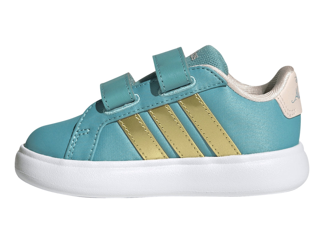 Tenis Adidas infantiles color turquesa con franjas doradas y gráfico de la Princesa Jasmine.
