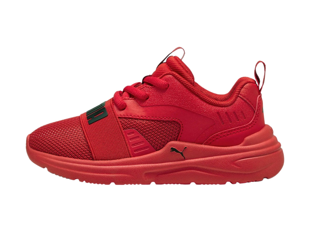 Tenis PUMA color rojo con detalles en negro, diseño deportivo para niños.