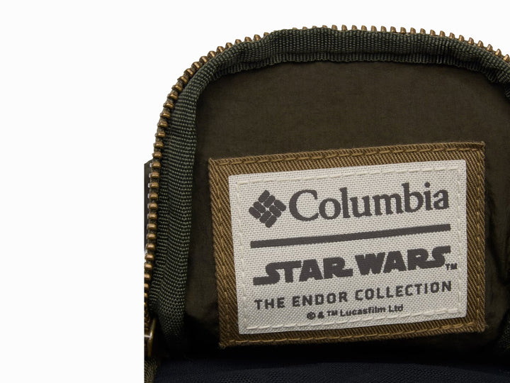 Bolsa de hombro Columbia color verde nori para botella con bolsillo pequeño integrado y correa ajustable.