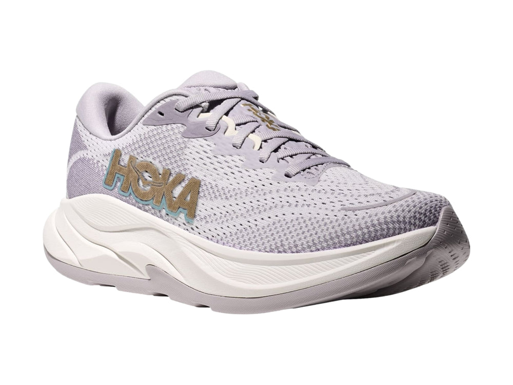 Tenis deportivos HOKA Rincon 4 color gris ceniza con suela blanca ancha y malla transpirable.