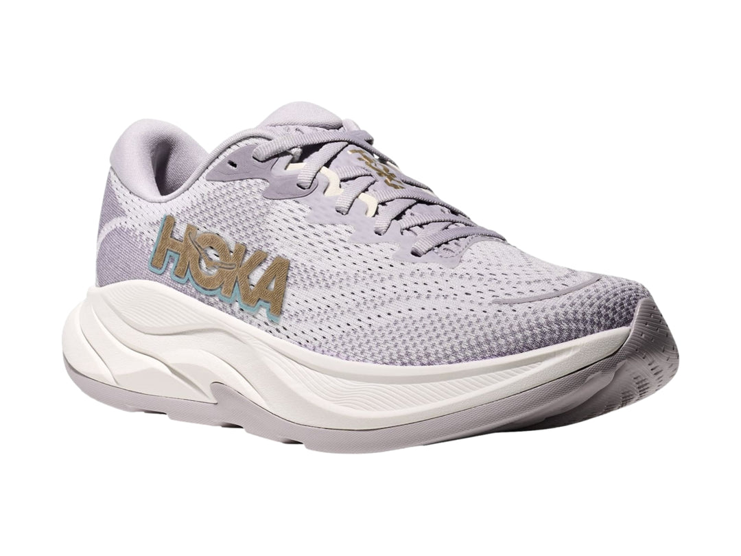 Tenis deportivos HOKA Rincon 4 color gris ceniza con suela blanca ancha y malla transpirable.