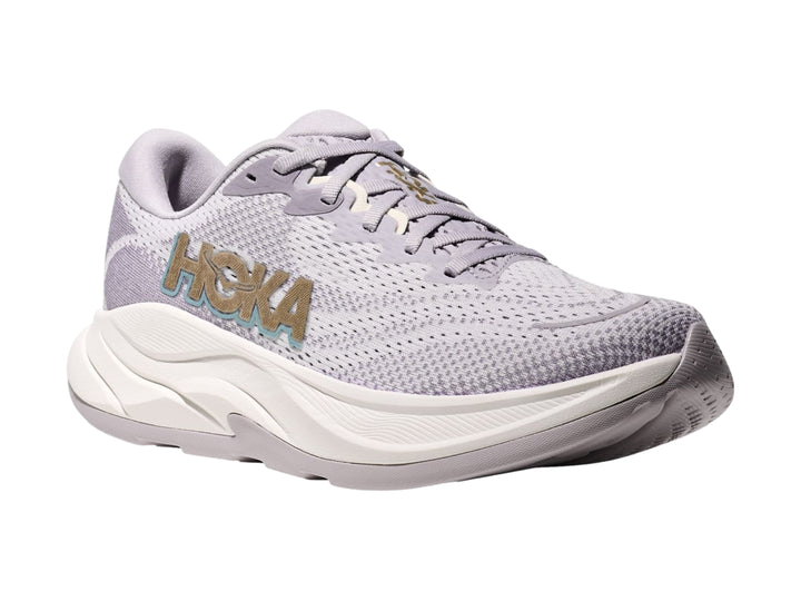 Tenis deportivos HOKA Rincon 4 color gris ceniza con suela blanca ancha y malla transpirable.