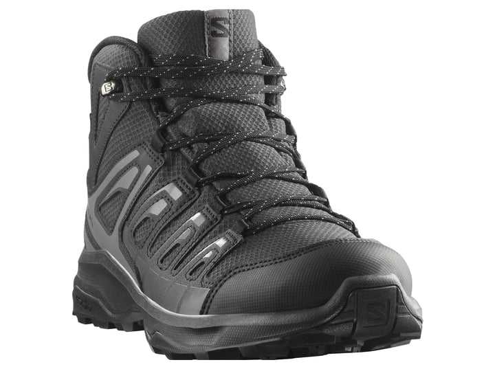 Bota deportiva Salomon Phantom Extegra Mid Gore-Tex en color negro, diseño robusto para senderismo.