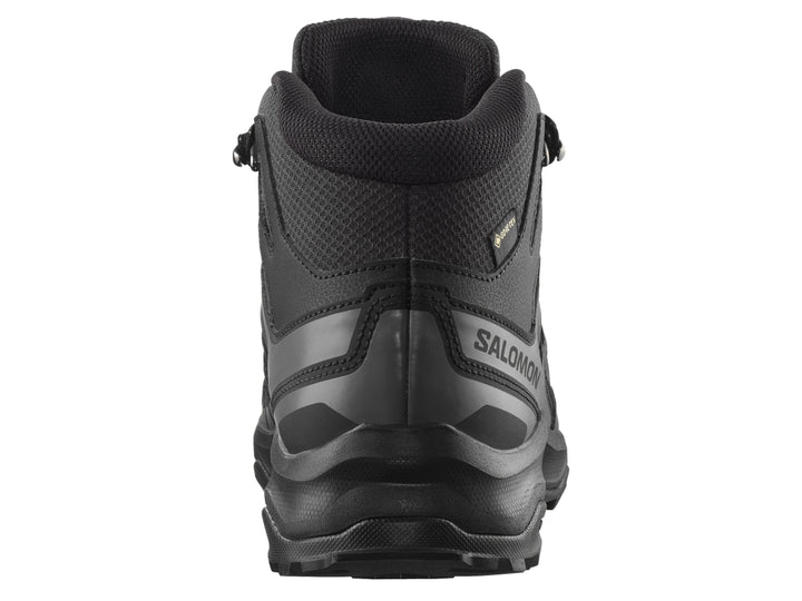 Bota deportiva Salomon Phantom Extegra Mid Gore-Tex en color negro, diseño robusto para senderismo.