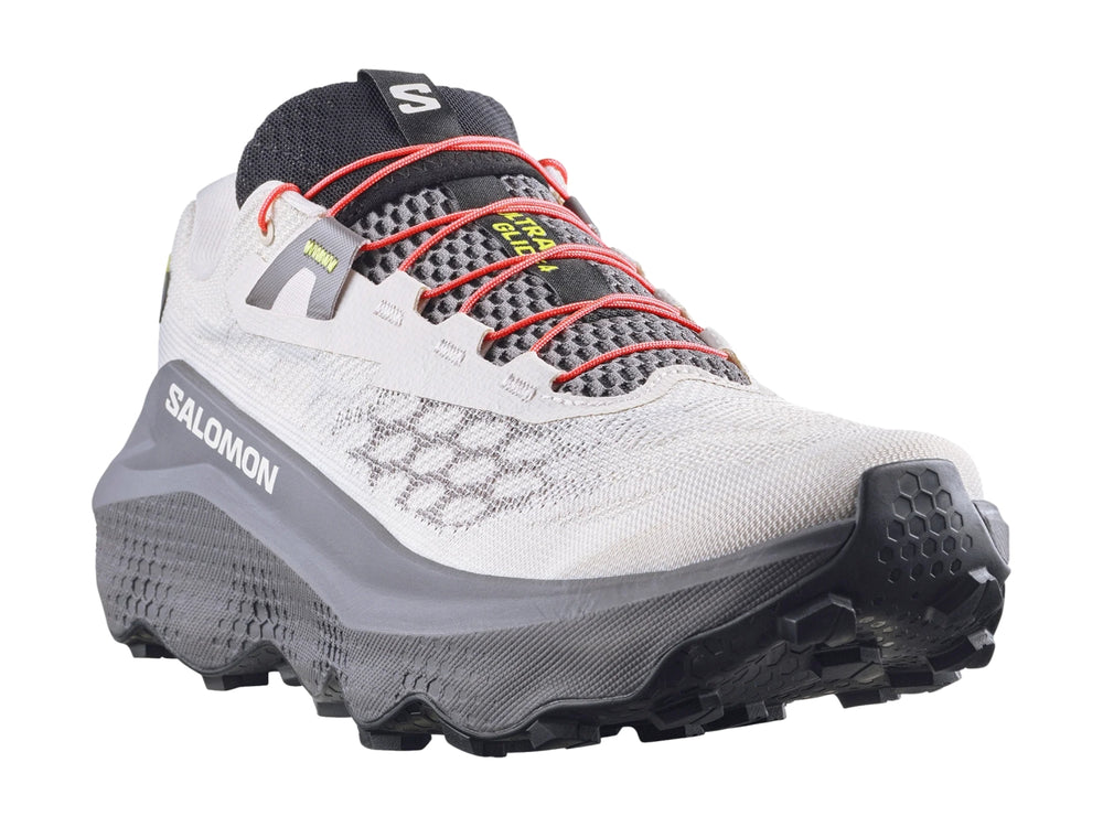Tenis deportivos Salomon Ultra Glide 4 color Lilac Ash con suela gris y detalles naranjas.