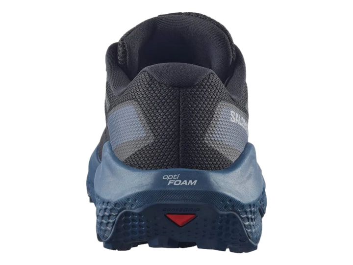 Zapato deportivo Salomon Ultra Flow 2 color negro con suela azul marino y detalles blancos.