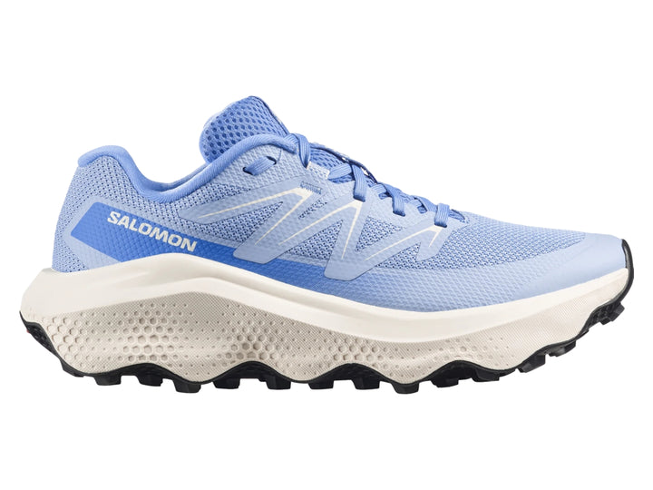 Tenis deportivos Salomon Ultra Flow 2 en color azul brunnera blue con suela blanca y negra para trail running.