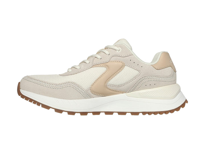 Tenis Skechers color blanco hueso con detalles en beige y suela marrón dentada