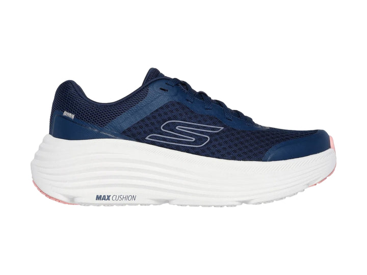 Tenis deportivos Skechers en color azul marino con suela blanca ancha y detalles en rosa.