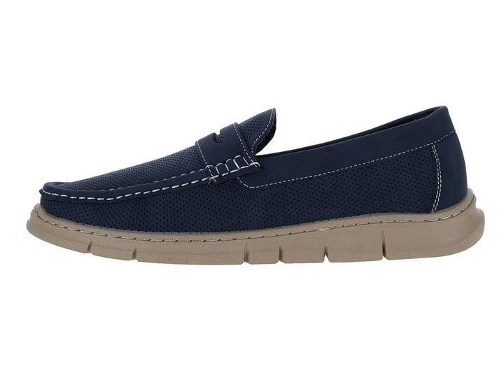 Zapato tipo mocasín color azul con suela beige y detalles perforados.