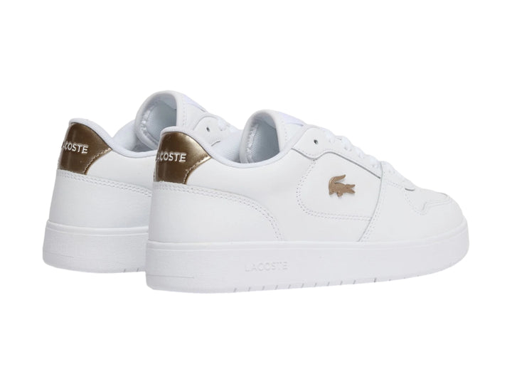 Tenis blancos Lacoste con detalles en color bronce en el talón y logo lateral.