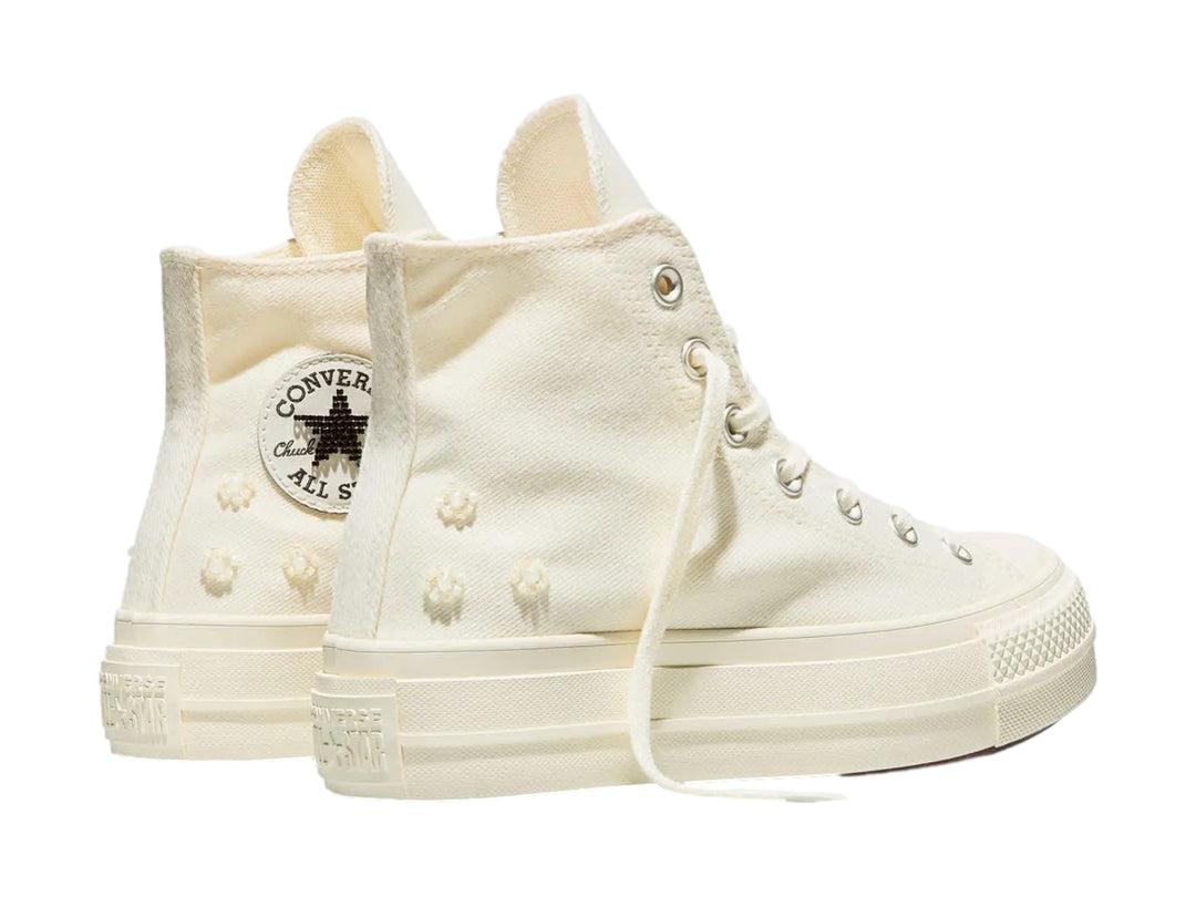 Tenis Converse Chuck Taylor All Star Lift Hi Platform color hueso con suela alta de plataforma.