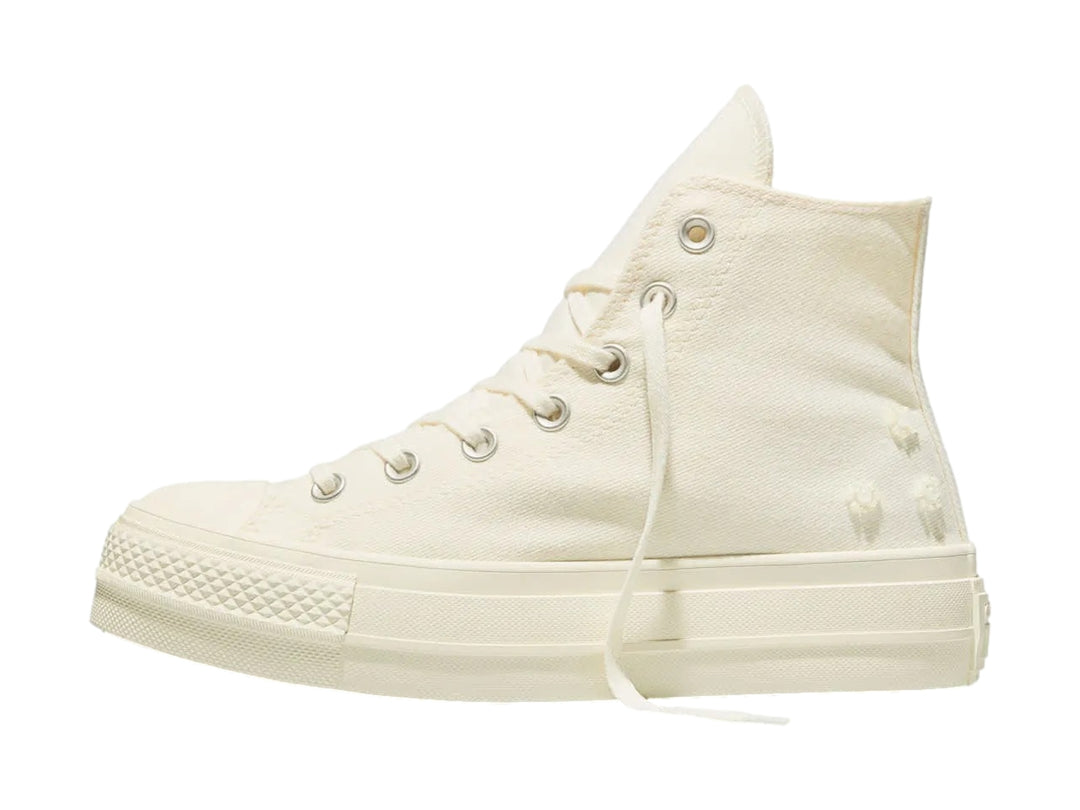 Tenis Converse Chuck Taylor All Star Lift Hi Platform color hueso con suela alta de plataforma.